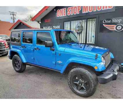 2014 Jeep Wrangler for sale is a Blue 2014 Jeep Wrangler Car for Sale in Denver CO