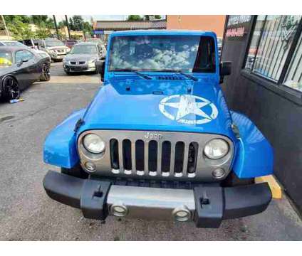2014 Jeep Wrangler for sale is a Blue 2014 Jeep Wrangler Car for Sale in Denver CO