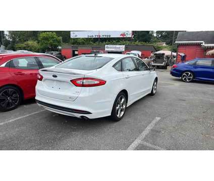 2014 Ford Fusion for sale is a White 2014 Ford Fusion Car for Sale in Hyattsville MD