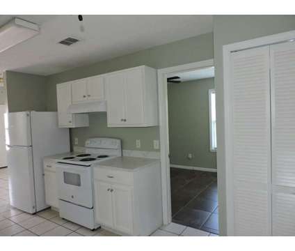 Stunning 2/1 Duplex Unit Near The Beach And The Lagoon at 5931 Pinetree Ave. in Panama City FL is a Home