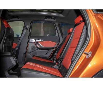 2023 BMW X1 xDrive28i is a Orange 2023 BMW X1 xDrive 28i SUV in Lake Bluff IL