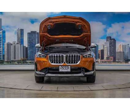 2023 BMW X1 xDrive28i is a Orange 2023 BMW X1 xDrive 28i SUV in Lake Bluff IL