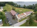 Inn for Sale: Lake shore farm Inn