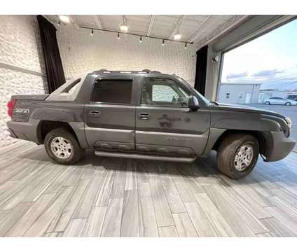 2004 Chevrolet Avalanche 1500 for sale is a Brown 2004 Chevrolet Avalanche 1500 Trim Car for Sale in Orlando FL