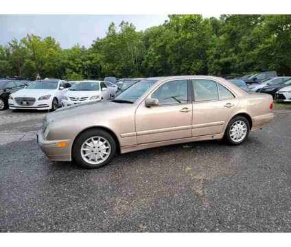 2002 Mercedes-Benz E-Class for sale is a Gold 2002 Mercedes-Benz E Class Car for Sale in Laurel MD