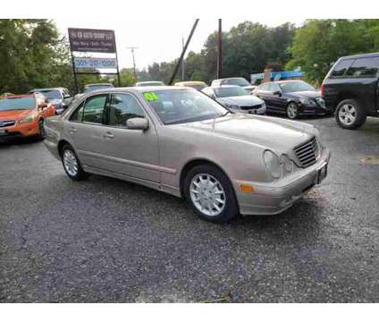 2002 Mercedes-Benz E-Class for sale is a Gold 2002 Mercedes-Benz E Class Car for Sale in Laurel MD