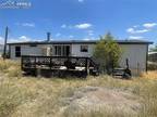 Canon City 3BR 2BA, Half-acre lot with endless potential!