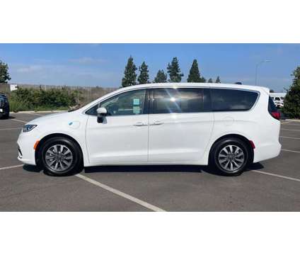 2023 Chrysler Pacifica Hybrid Touring L is a White 2023 Chrysler Pacifica Hybrid in Cerritos CA