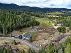 This 5.37 acre is the quintessential example of North Idaho!