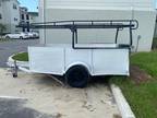 Great ten foot by 6 foor utility trailer with a LADDER RACK