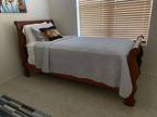 Solid wood sleigh bed style bed frame with new twin size mattress