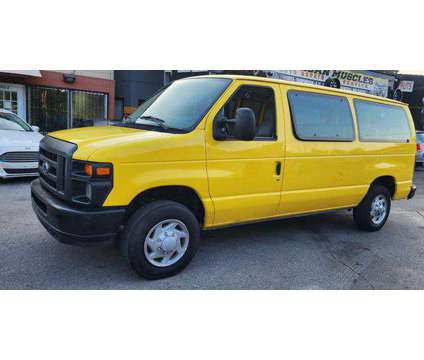 2011 Ford E150 Cargo for sale is a Yellow 2011 Ford E150 Cargo Car for Sale in Tampa FL