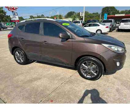 2015 Hyundai Tucson for sale is a Brown 2015 Hyundai Tucson Car for Sale in Fayetteville AR