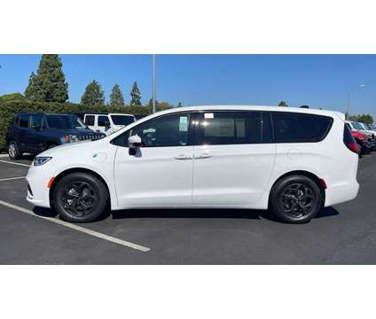 2023 Chrysler Pacifica Hybrid Touring L is a White 2023 Chrysler Pacifica Hybrid in Cerritos CA