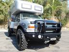 2010 Ford F-550 Super Duty crew-cab pickup 4×4 EarthRoamer Camper