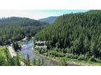 2 Heavily Wooded Acres W/ Over 400' of Moyie River Frontage