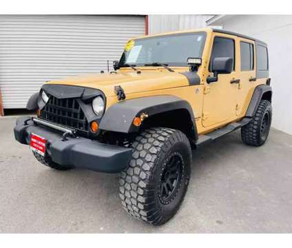 2013 Jeep Wrangler for sale is a Tan 2013 Jeep Wrangler Car for Sale in San Antonio TX
