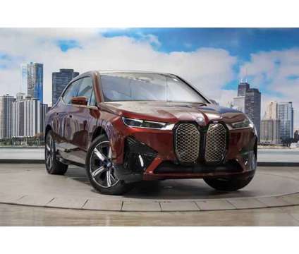 2024 BMW iX xDrive50 is a Red 2024 BMW 325 Model iX SUV in Lake Bluff IL