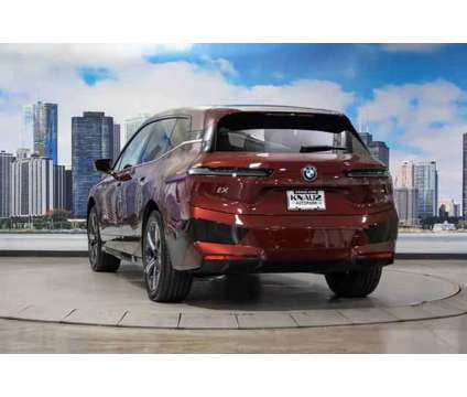 2024 BMW iX xDrive50 is a Red 2024 BMW 325 Model iX SUV in Lake Bluff IL