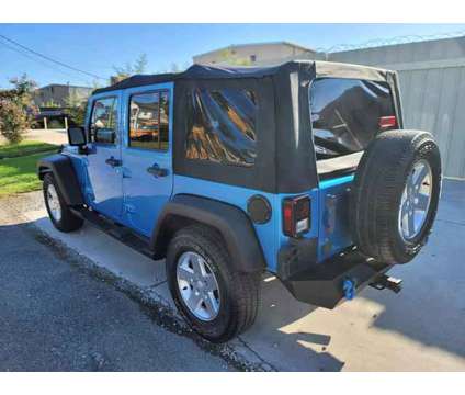 2010 Jeep Wrangler for sale is a Blue 2010 Jeep Wrangler Car for Sale in Kenner LA