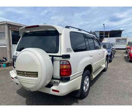 1998 TOYOTA LAND CRUISER for sale is a White 1998 Toyota Land Cruiser Car for Sale in Houston TX