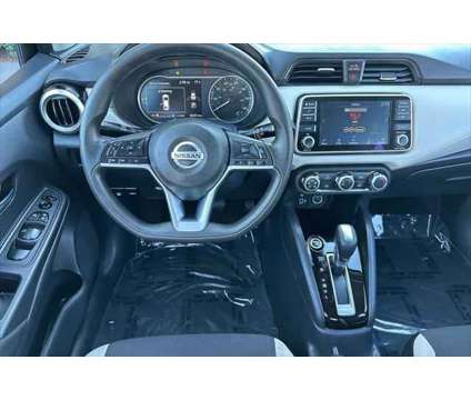 2021 Nissan Versa SV is a Black 2021 Nissan Versa 1.6 Trim Sedan in Eugene OR