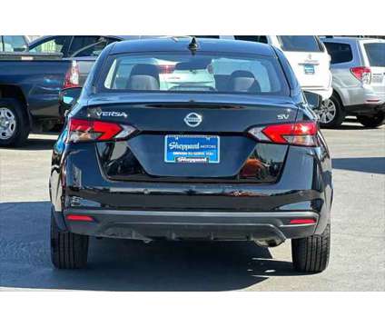 2021 Nissan Versa SV is a Black 2021 Nissan Versa 1.6 Trim Sedan in Eugene OR