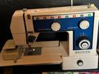 Vintage embroidery Elgin sewing machine with all a