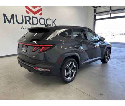 2023 Hyundai Tucson SEL is a Grey 2023 Hyundai Tucson SUV in Logan UT