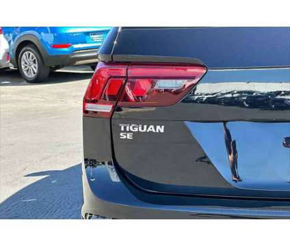 2020 Volkswagen Tiguan SE is a Black 2020 Volkswagen Tiguan SE SUV in Eugene OR