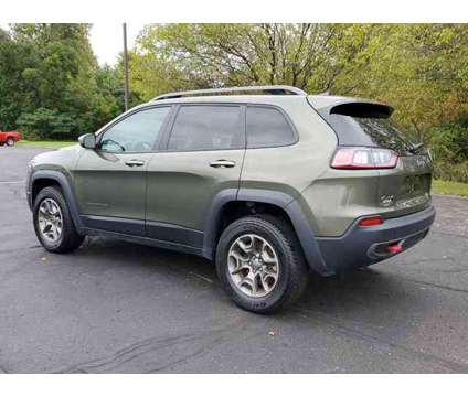 2020 Jeep Cherokee Trailhawk is a Green 2020 Jeep Cherokee Trailhawk Car for Sale in Paw Paw MI