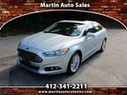 Used 2013 Ford Fusion Hybrid for sale.