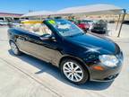 2010 Volkswagen Eos Komfort hard top convertible.