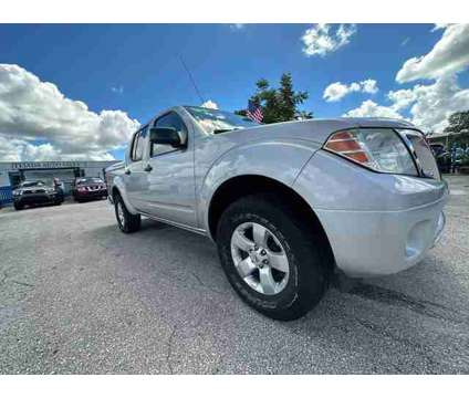 2013 Nissan Frontier Crew Cab for sale is a Silver 2013 Nissan frontier Car for Sale in Orlando FL
