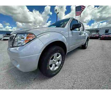 2013 Nissan Frontier Crew Cab for sale is a Silver 2013 Nissan frontier Car for Sale in Orlando FL