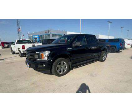 2018 Ford F-150 XLT is a Black 2018 Ford F-150 XLT Truck in Grand Island NE