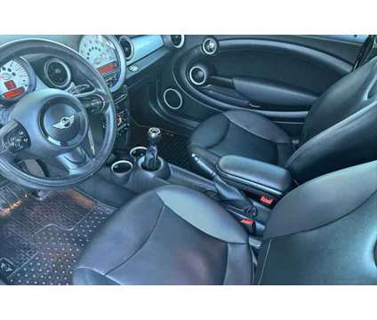 2013 MINI Cooper Hardtop Cooper is a White 2013 Mini Cooper 2dr Hatchback in Eugene OR