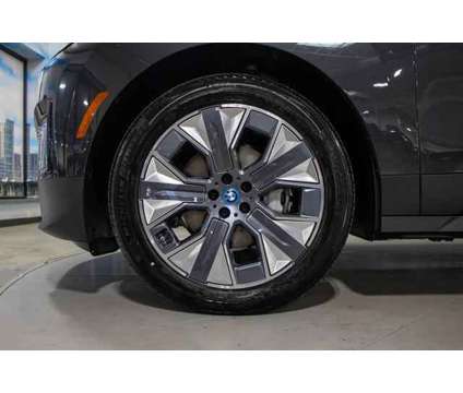 2024 BMW iX xDrive50 is a Grey 2024 BMW 325 Model iX SUV in Lake Bluff IL