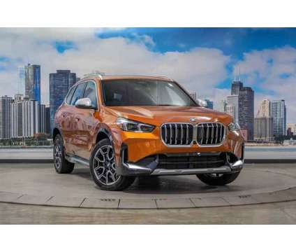 2023 BMW X1 xDrive28i is a Orange 2023 BMW X1 xDrive 28i SUV in Lake Bluff IL