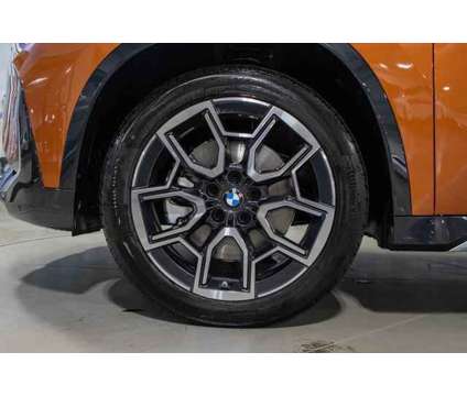 2023 BMW X1 xDrive28i is a Orange 2023 BMW X1 xDrive 28i SUV in Lake Bluff IL