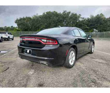 2023 Dodge Charger SXT is a Black 2023 Dodge Charger SXT Car for Sale in Orlando FL