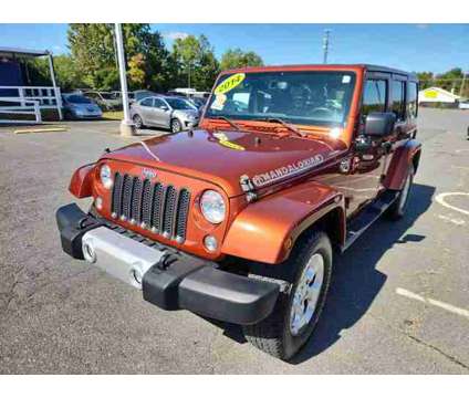 2014 Jeep Wrangler for sale is a Orange 2014 Jeep Wrangler Car for Sale in Monroe NC