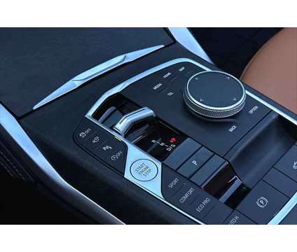 2024 BMW 4 Series 430i Convertible is a Black 2024 BMW 430 Model i Convertible in Seaside CA