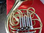 Jupiter Double French Horn with case. Missing mouthpiece. Requires service.