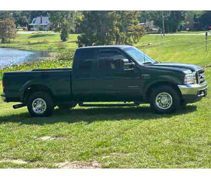 2002 Ford F250 Super Duty Super Cab for sale is a Green 2002 Ford F-250 Super Duty Car for Sale in Haines City FL