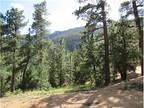 Beautiful Treed Lot with Mountain Views