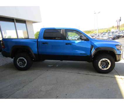 2024NewRamNew1500New4x4 Crew Cab 5 7 Box is a Blue 2024 RAM 1500 Model Car for Sale in Brunswick OH
