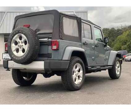 2014 Jeep Wrangler for sale is a Grey 2014 Jeep Wrangler Car for Sale in Vineland NJ