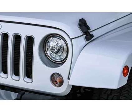 2018 Jeep Wrangler JK Unlimited Sahara is a White 2018 Jeep Wrangler SUV in Ontario CA