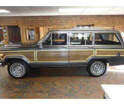 1989UsedJeepUsedGrand WagoneerUsed4dr Wagon 4WD is a Blue 1989 Jeep grand wagoneer Car for Sale in Hamilton OH